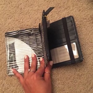 travels! Passport holder. Easy to find in purse.